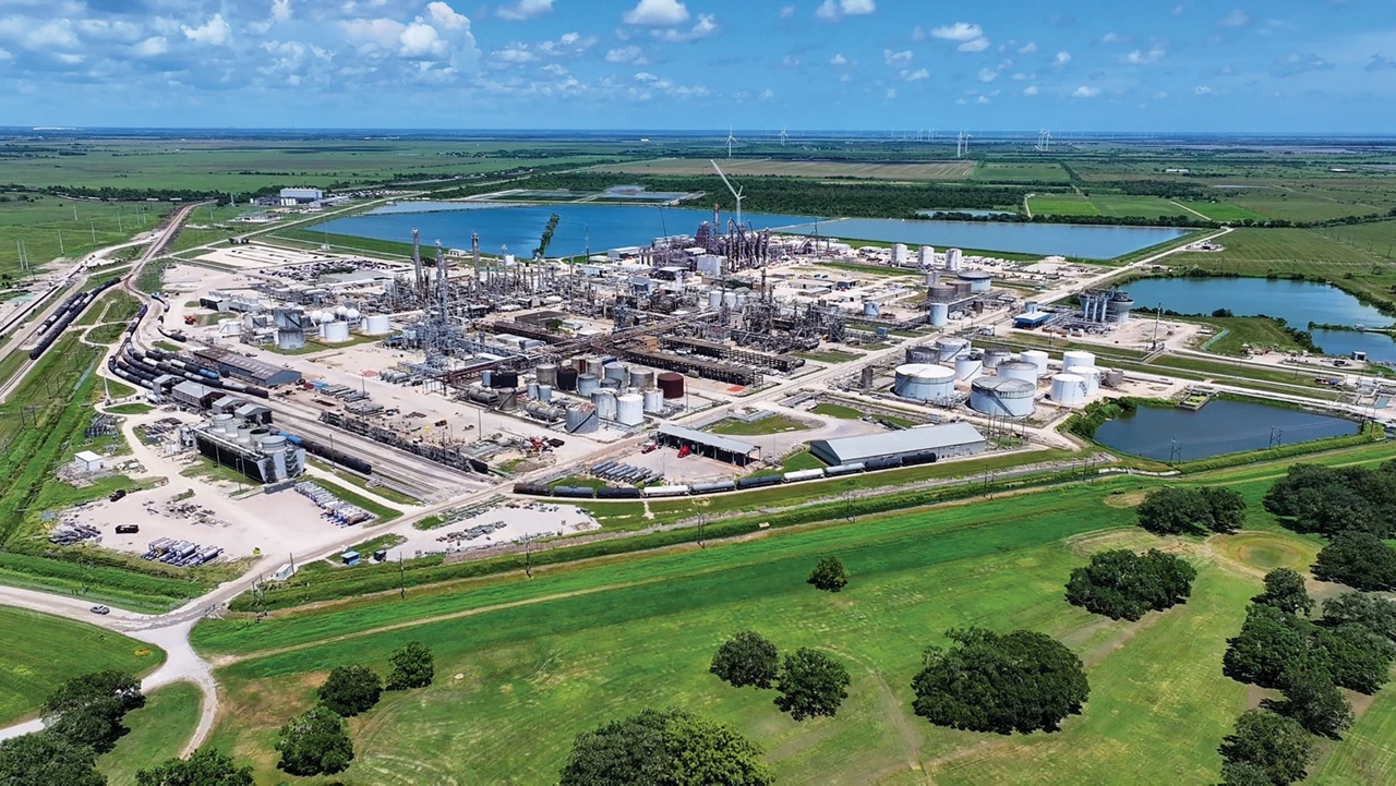 An aerial view of a chemical plant against a blue sky.